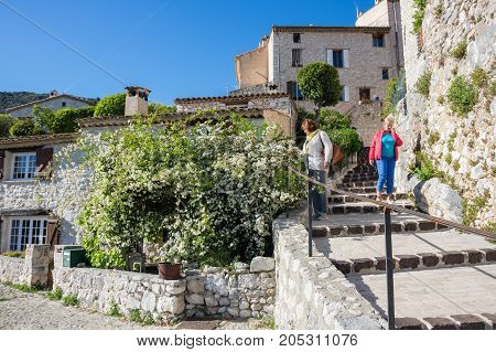 TOURRETTES-SUR-LOUP FRANCE - APRIL 25 2016: Street of Tourrettes-sur-Loup a medieval village in the Alpes-Maritimes department in southeastern France