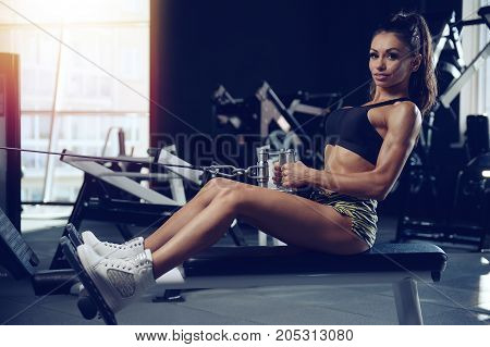 Sexy Athletic Young Girl Training Back In Gym