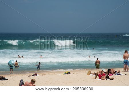 SYDNEY,NSW,AUSTRALIA-NOVEMBER 21,2016: Beachgoers at Bondi Beach on the Pacific Ocean coast in Sydney, Australia.