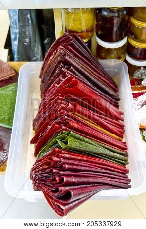 Background from colored oriental sweets in marketplace