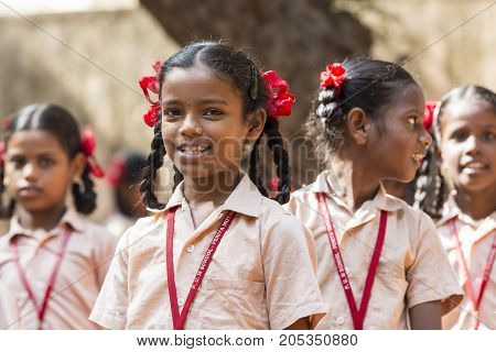 PONDICHERY PUDUCHERY INDIA - SSEPTEMBER 04 2017. School parade of each monday morning with children students in uniforms. They walk sing and pray before going in the classrooms.