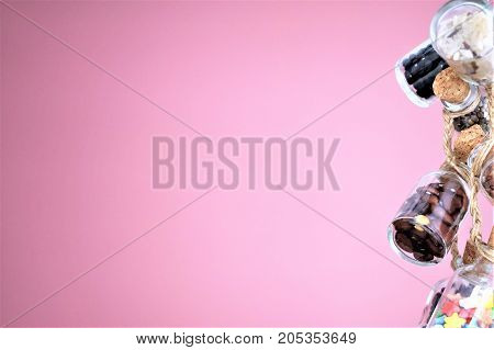 Collection of grain products, lentils, soybeans and red beans in storage jars over on free background. Quinoa, bulgur and couscous cereals. Vegetarian and dieting food concept.