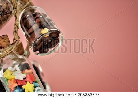 Collection of grain products, lentils, soybeans and red beans in storage jars over on free background. Quinoa, bulgur and couscous cereals. Vegetarian and dieting food concept. Cereals in glass jars