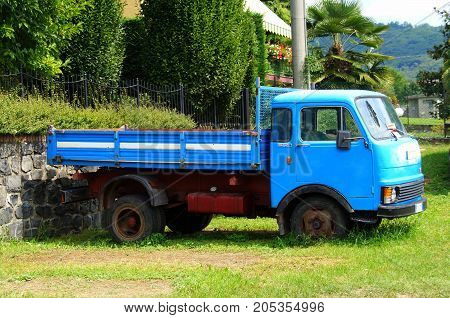 Endine Gaiano, Italy - August 18, 2017: Blue Fiat OM 40 truck parked by the side of the road. Nobody in de vehicle.
