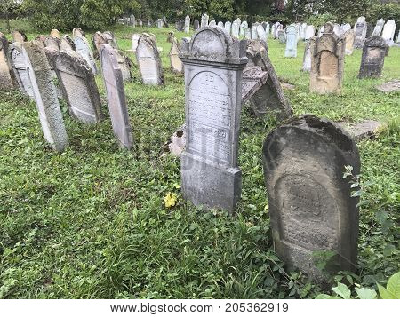 Teresva, Ukraine, September 18, 2017; An Old Jewish Cemetery. Shattered Gravestones Stand Among The