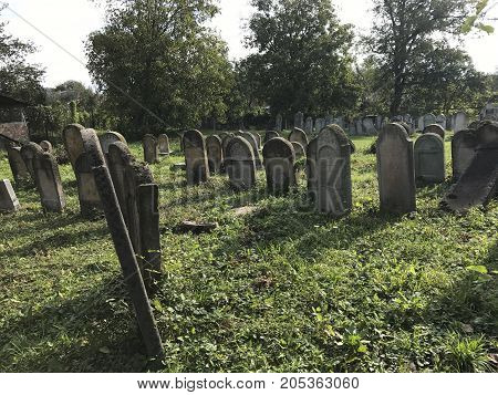 Teresva, Ukraine, September 18, 2017; An Old Jewish Cemetery. Shattered Gravestones Stand Among The