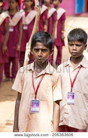 PONDICHERY PUDUCHERY INDIA - SSEPTEMBER 04 2017. School parade of each monday morning with children students in uniforms. They walk sing and pray before going in the classrooms.