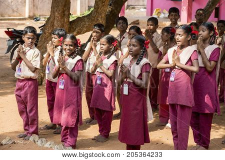 PONDICHERY PUDUCHERY INDIA - SSEPTEMBER 04 2017. School parade of each monday morning with children students in uniforms. They walk sing and pray before going in the classrooms.