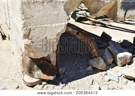 Close up of ruined stone building in the desert. Rust and decay.