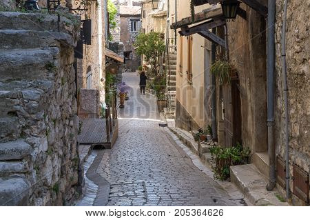 TOURRETTES-SUR-LOUP FRANCE - APRIL 25 2016: Street of Tourrettes-sur-Loup a medieval village in the Alpes-Maritimes department in southeastern France