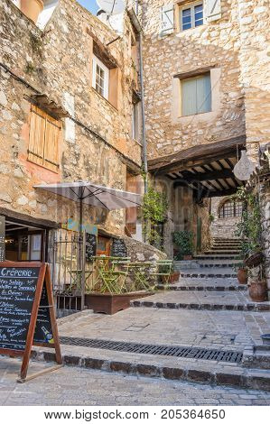TOURRETTES-SUR-LOUP FRANCE - APRIL 25 2016: Street of Tourrettes-sur-Loup a medieval village in the Alpes-Maritimes department in southeastern France