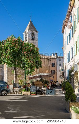 TOURRETTES-SUR-LOUP FRANCE - APRIL 25 2016: Street of Tourrettes-sur-Loup a medieval village in the Alpes-Maritimes department in southeastern France