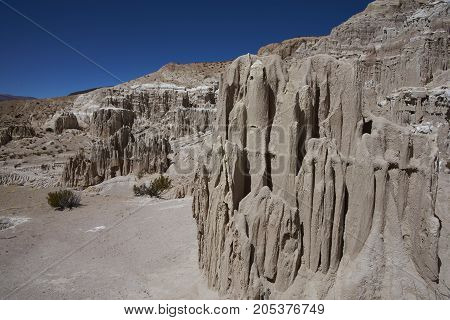 Eroded rock formations along Quebrada Chuba, a river valley high on the Altiplano of northern Chile in Lauca National Park.