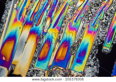 colorful microscopic shot of Sodium nitrate microcrystals in polarized light