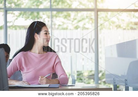 Bussiness concept Bussiness woman working with bill on wooden table.