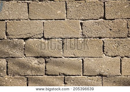 Smooth wall of dark cubes under daylight