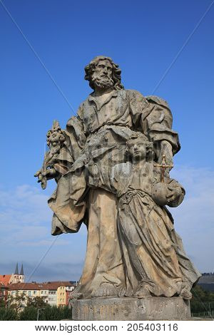 Baroque Statue of Saint of Josephus on old Main Bridge in Wurzburg. Franconia. Germany
