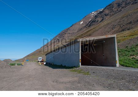 Olafsfjordur road tunnel through a mountain in Iceland