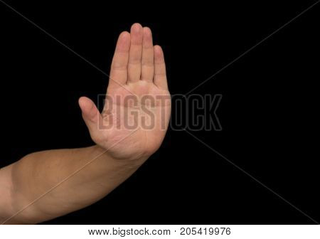 hand on a black background . Photo of an abstract texture