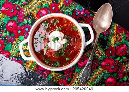 Ukrainian Traditional Borsch. Russian Vegetarian Red Soup  In White Bowl On Black Background. Top Vi