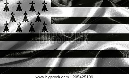 Realistic flag of Brittany on the wavy surface of fabric. This flag can be used in design