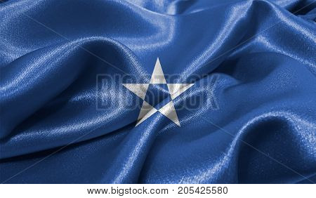 Realistic flag of Somalia on the wavy surface of fabric. This flag can be used in design