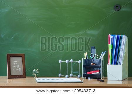 Teacher or student desk table. Education background. Education concept. School accessories on the table.