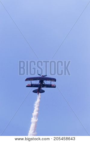Sivrihisar Eskisehir Turkey - September 17 2017: Sivrihisar Airshows (SHG) small aviation event displayed in SUSHM. Ali Ismet Ozturk flying with his aerobatic plane 
