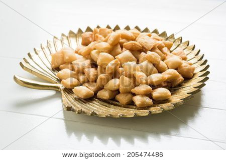 stock photo of  variety of Shakkar pare Also Know as Shakkarpare, Shakarpali, Shakkar Para, or Shankarpalli or shankar pale is a Snack Typically Made in India During Diwali