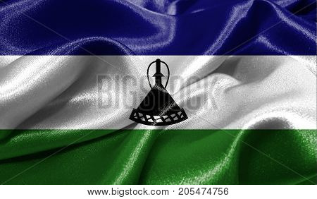 Realistic flag of Lesotho on the wavy surface of fabric. This flag can be used in design