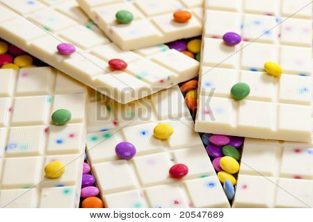 still life of white chocolate with smarties
