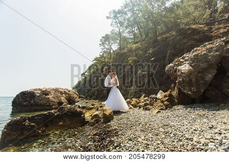 Romantic dating. Young loving couple embracing on nature.