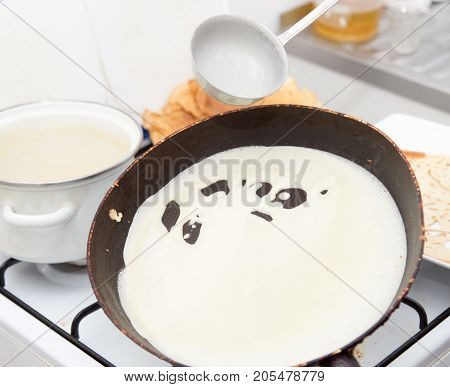 pancakes in a frying pan . Photos from the studio