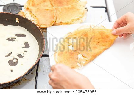 pancakes in a frying pan . Photos from the studio