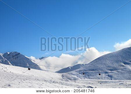 Gondola Lift And Off-piste Ski Slope