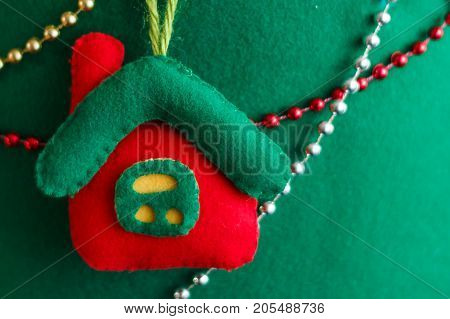 Happy New Year and Christmas. Christmas decorations. Red house.