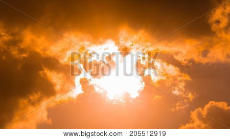 The sun is covered with clouds in sunsetOrange cloud from sunlight