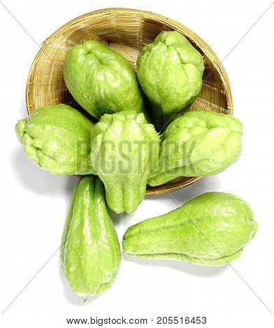 Chayote in basket on white background are healthy food