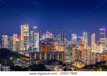 Singapore cityscape at night and business downtown.