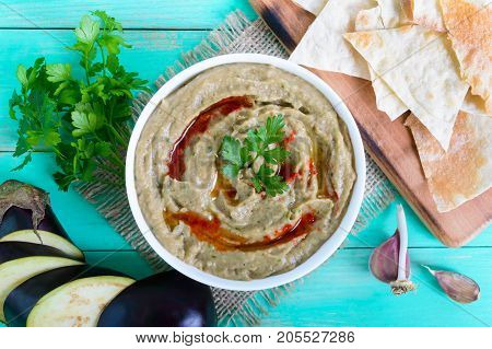 Baba ganush - hummus from eggplant with seasoning parsley. Eastern cuisine.