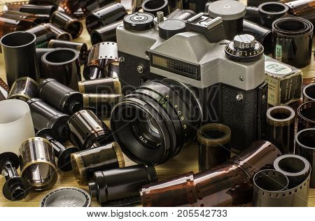old camera zenith and bunch of films.