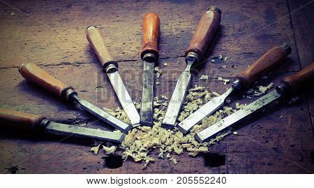 Sharp Chisels With Sawdust And Vintage Effect