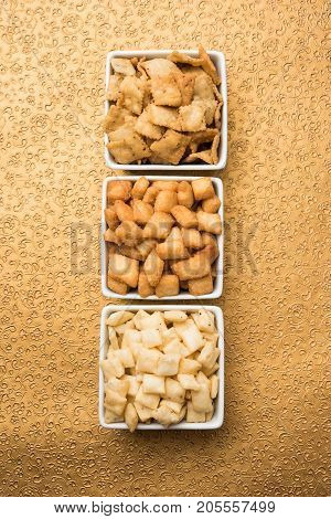 stock photo of  variety of Shakkar pare Also Know as Shakkarpare, Shakarpali, Shakkar Para, or Shankarpalli or shankar pale is a Snack Typically Made in India During Diwali