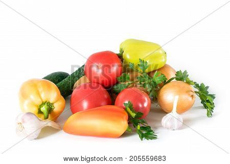 Still life with bell pepper cucumbers and tomatoe