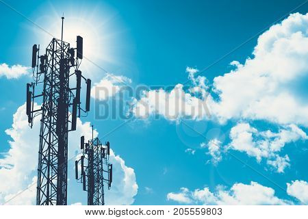 Communication Tower Or 3G 4G Network Telephone Cellsite Silhouette On Blue Sky And Space For Text