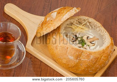 Soup In A Bread Bowl On The Board