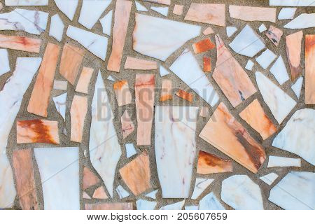 Colorful marble wall with cement fas background