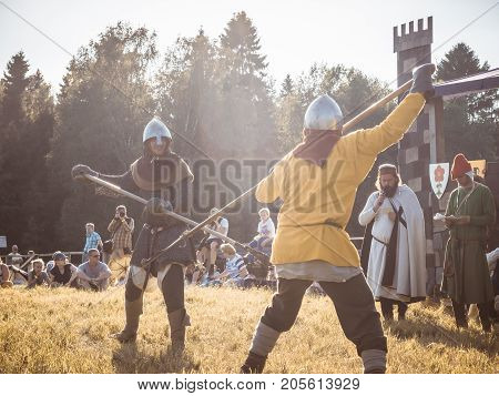 Moscow,russia-june 06,2016: Martial Duel Of Two Medieval Spearman Warriors. Opponents With Spear In