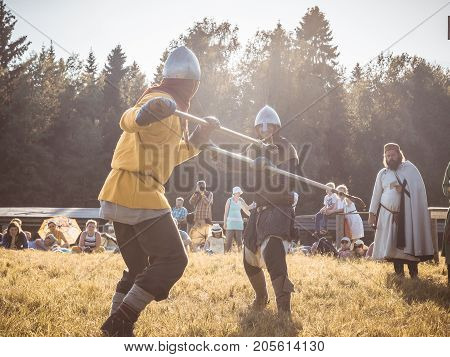 Moscow,russia-june 06,2016: Martial Duel Of Two Medieval Spearman Warriors. Opponents With Spear In