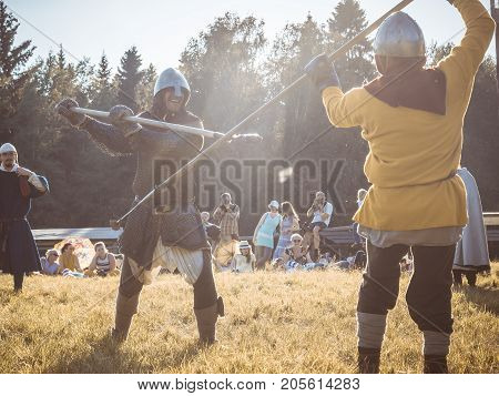 Moscow,russia-june 06,2016: Martial Duel Of Two Medieval Spearman Warriors. Opponents With Spear In